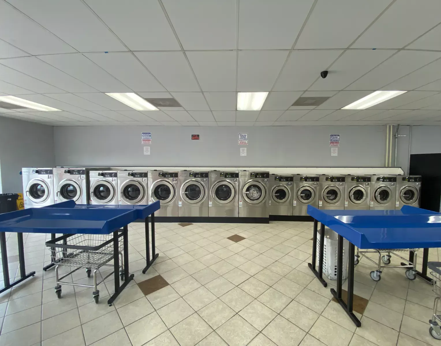 Front-load washers and rolling laundry carts